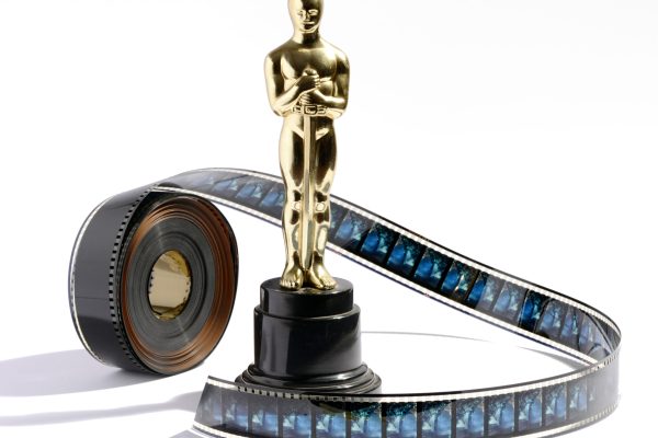 Replica Oscar statue with a roll of movie film Selena Movie